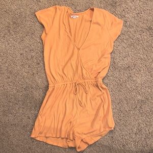 O’Neill romper. Size medium. Orange color